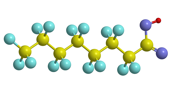 Illustration of molecule includes yellow, blue and purple balls representing atoms. 