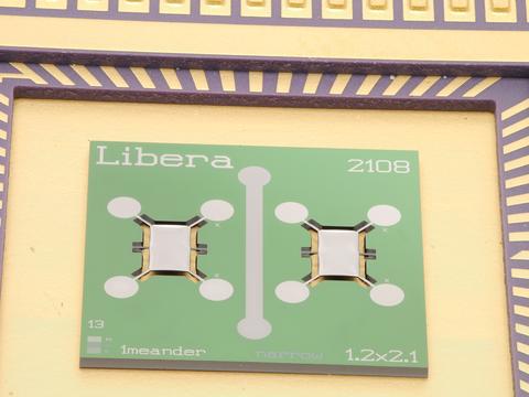 Close-up of chip shows green square reading "Libera."