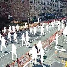 This image shows people running on a road with an overlay depicting video object segmentation.
