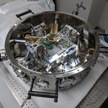 Prototype cryogenic atomic force microscope system with nanoscale electron spin resonance capability