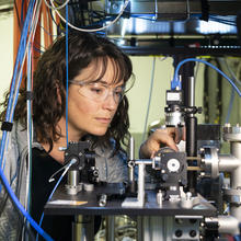 Scientist working at scientific equipment