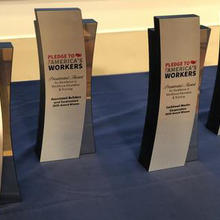Trophies for the inaugural Pledge to America’s Workers Presidential Award.