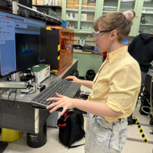 Julie Rieland, a researcher, looks at data on her computer screen in her lab.