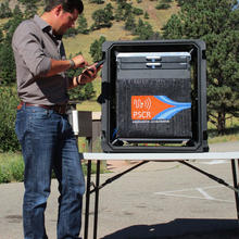 NIST engineer Ben Posthuma demonstrates the use of NIST's Rapidly Deployable Public Safety Research Platform