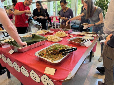 Staff sample dumplings made by NIST employees during an Asian American, Native Hawaiian and Pacific Islander Heritage Month event in 2024. 