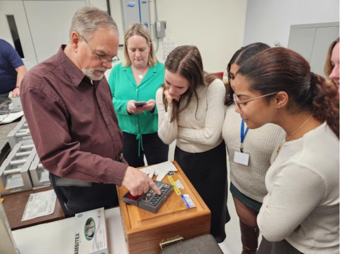 Northeastern University students tour the Massachusetts state metrology laboratory, observing the state standards, as well as the precision weighing and volumetric calibration processes