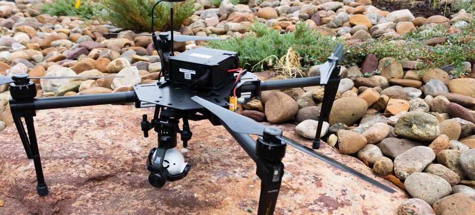 A drone resting on a rock