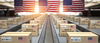 Cardboard boxes with text made in USA and American flag on the roller conveyor