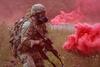 Photo of a soldier wearing a gas mask. 